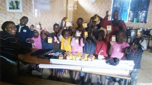 The children at the Good Samaritan Home, receiving the LED bulbs.